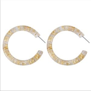 Acrylic hoop earrings with gold flecks